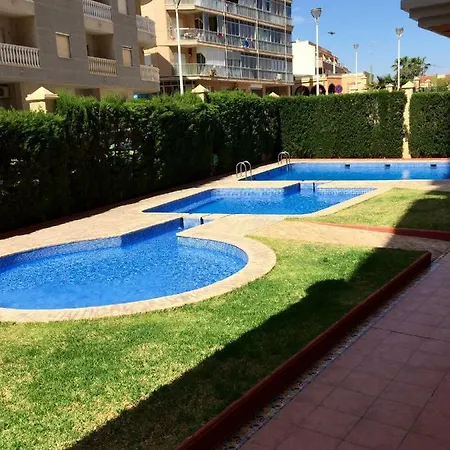 Tus Vacaciones Junto Al Mar Апартаменты Торевьиа